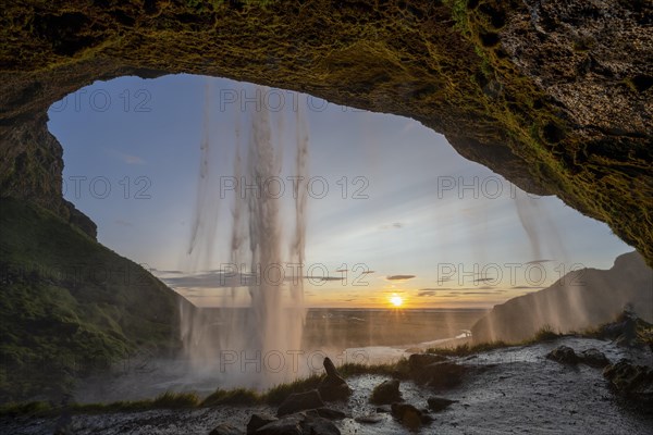 Seljalandsfoss waterfall at sunset