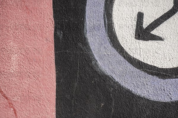 Lower graffiti with arrow black with red background