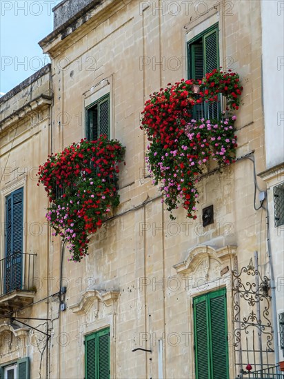 Italian house with balcony and flower boxes