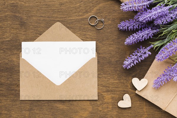 Flat lay wedding invitation with lavender