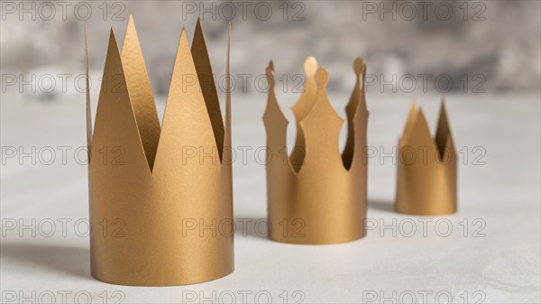 Golden crowns blurred background