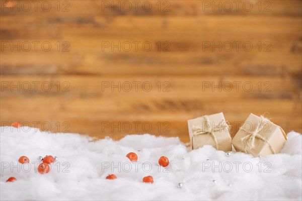 Present boxes decorative snow near wall