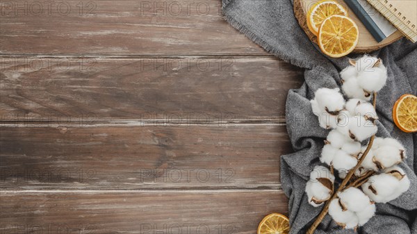 Top view cotton dried oranges with copy space