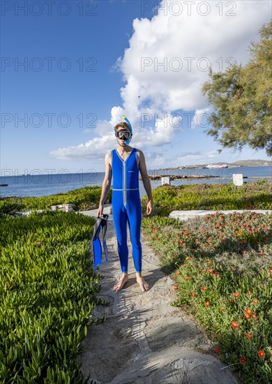 Young man with diving goggles