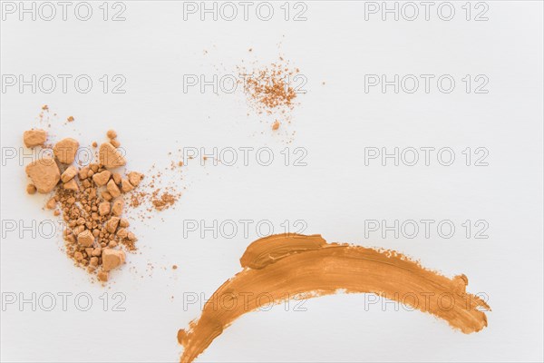 Crush compact powder white background