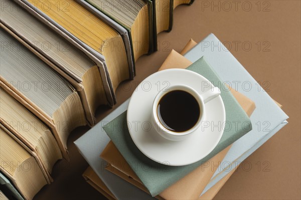 Books arrangement with cup cofee