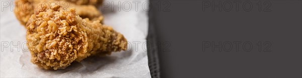 Close up fried chicken wings with copy space