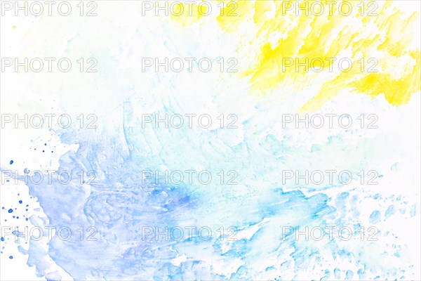Abstract splashes yellow turquoise paint