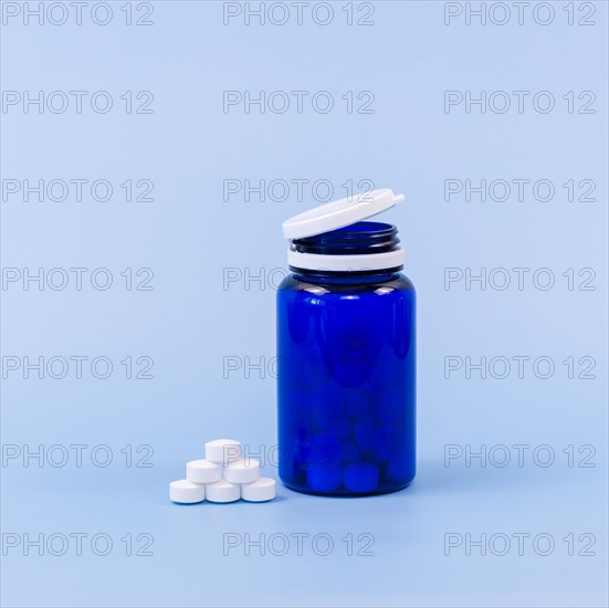 High angle pills plastic container with copy space
