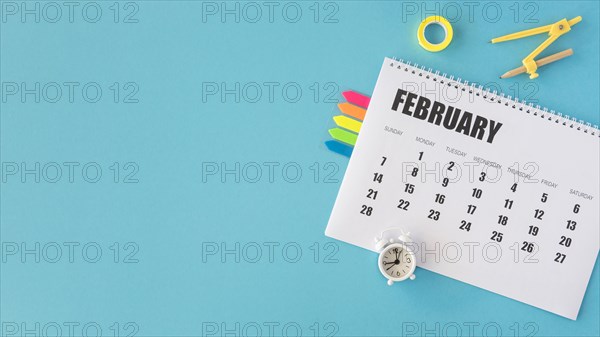 Top view stationery calendar copy space