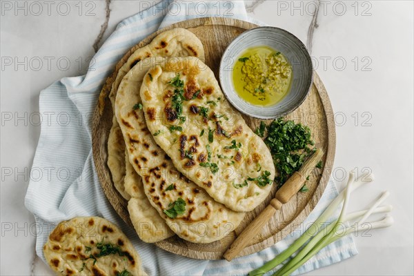 Pakistani food wooden board flat lay