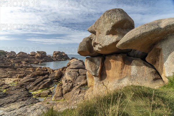 The rocks of the pink granite coast Cote de Granit Rose near Ploumanac'h