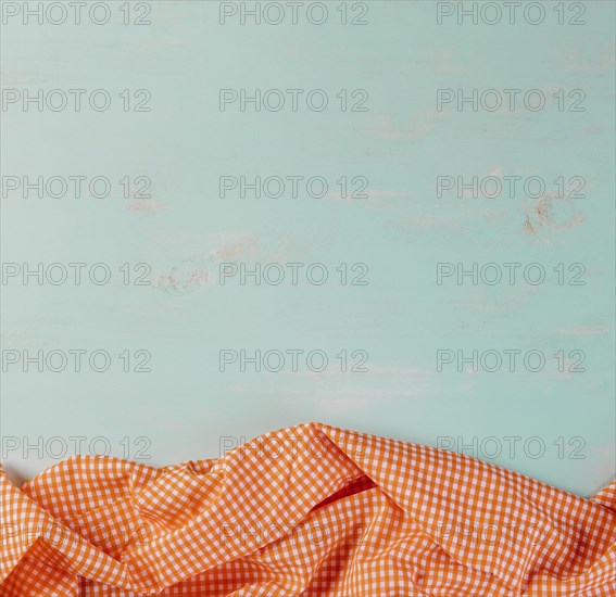 Checkered tablecloth blue background