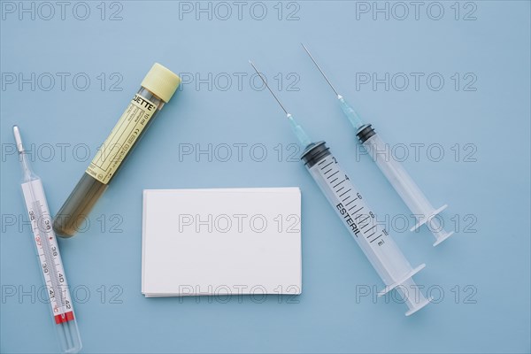 Syringes thermometer sample with business card