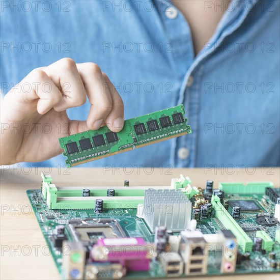 It person repairing hardware equipment s