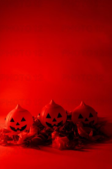 Halloween pumpkins on a red background