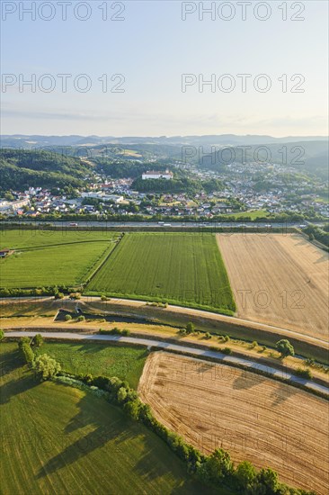 Aerial view over the fields and forests to the castle in Woerth an der Donau