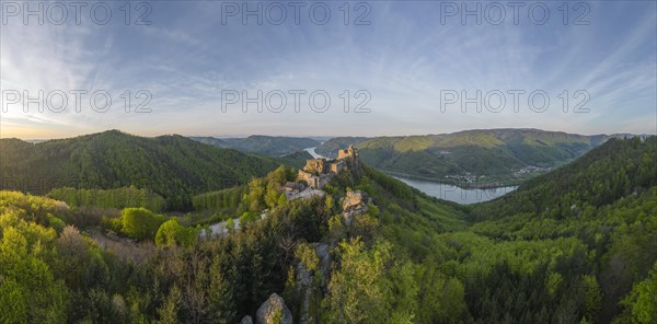 Drone shot of Aggstein Ruin at sunrise with Danube