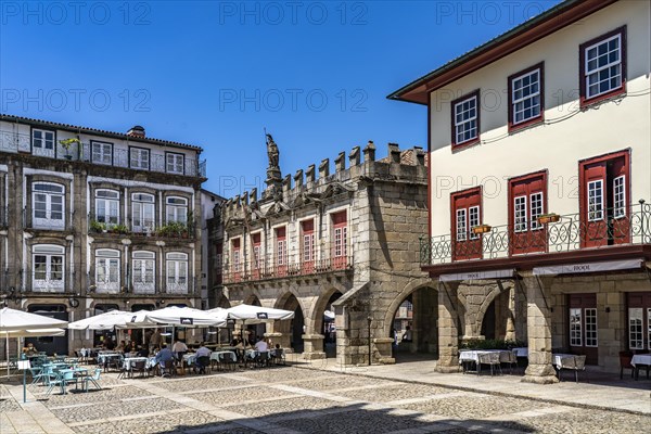 Restaurants at the Praca de Sao Tiago square and the former town hall in the old town of Guimaraes