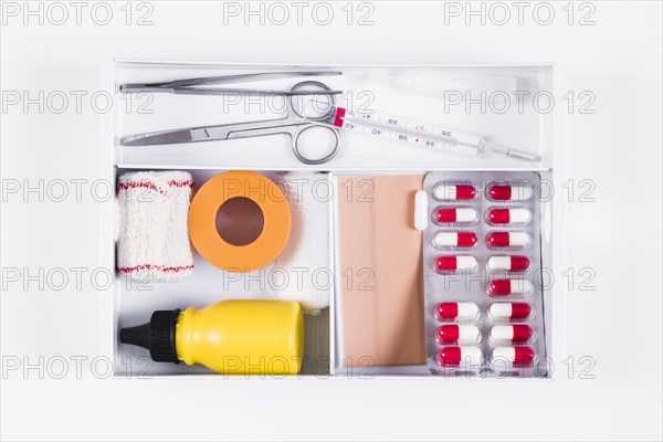 Open first aid kit white background