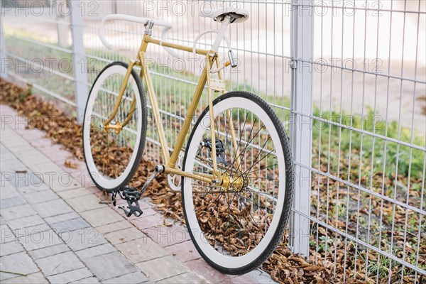 Bicycle near fence