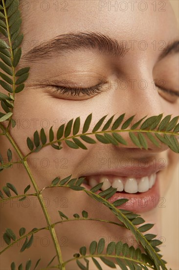 Smiley model posing with plant