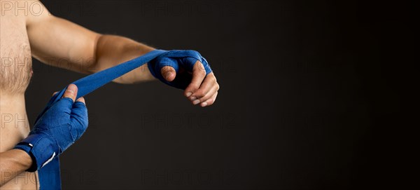 Side view man preparing boxing