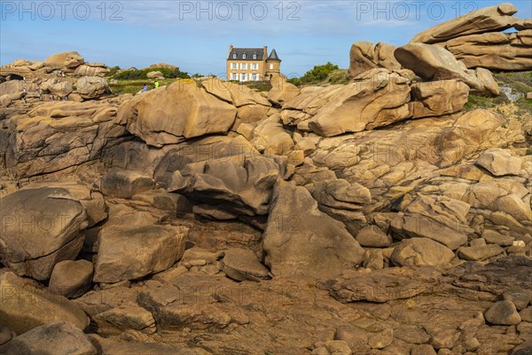 The rocks of the pink granite coast Cote de Granit Rose and Maison Gustave Eiffel near Ploumanac'h