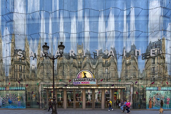 Reflection in the shop window of the exclusive department stores' La Samaritaine