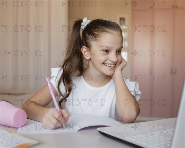 Girl paying attention online lessons home