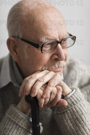 Smiley old man nursing home with cane