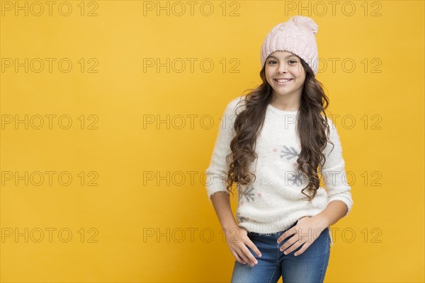 Smiling girl sweater with snowflakes