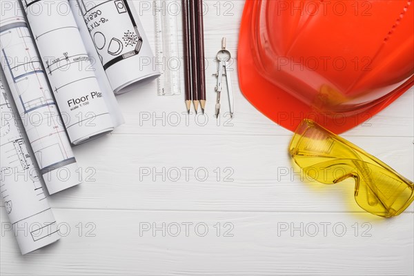 Different supplies wooden table