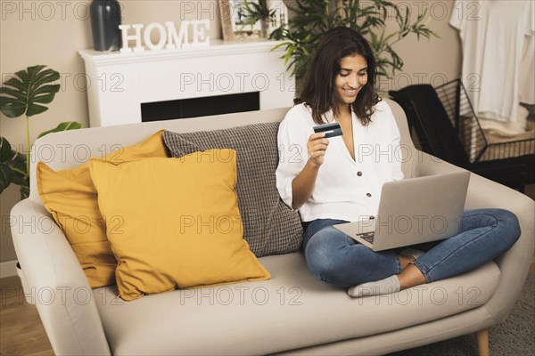 Woman holding credit card