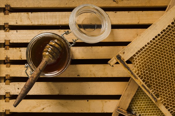 Top view glass jar full honey