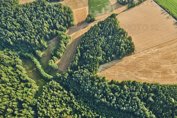 Aerial view over the fields and forests near Woerth an der Donau