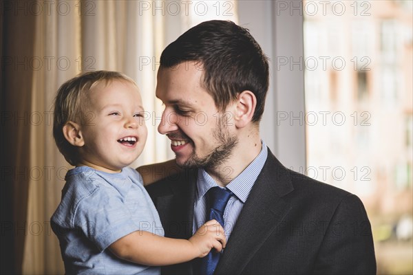 Father son laughing