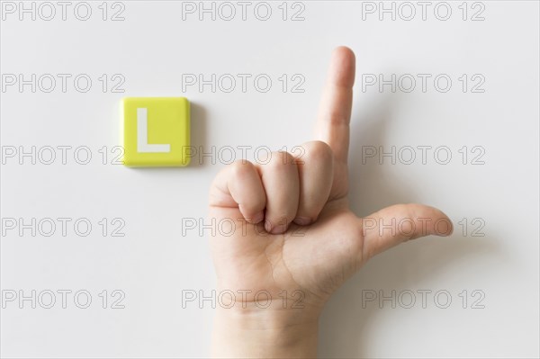 Sign language hand showing letter l
