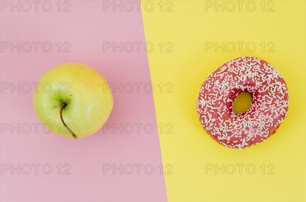 Top view donut vs fruit