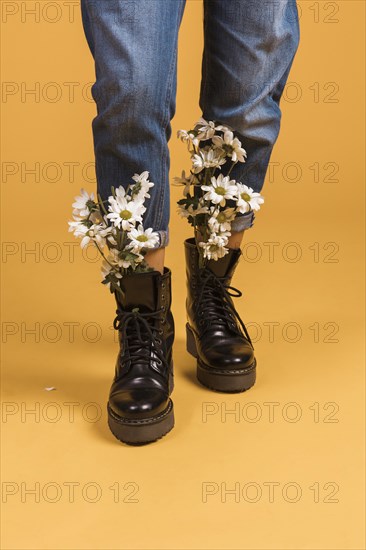 Woman legs with flowers shoes