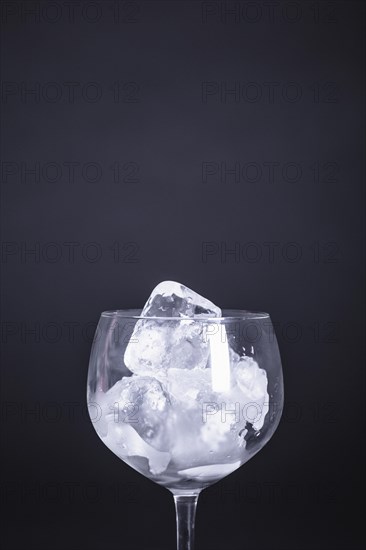 Empty glass with ice