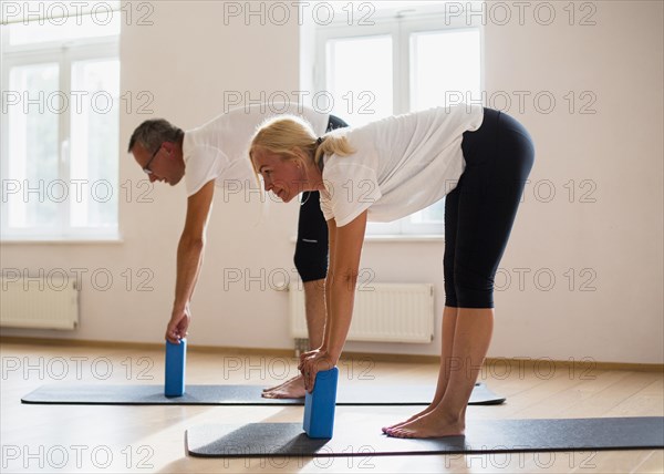 Adult friends training together gym