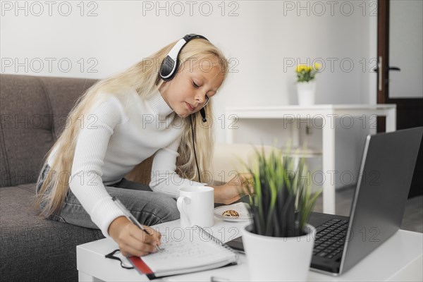 Portrait girl paying attention online class