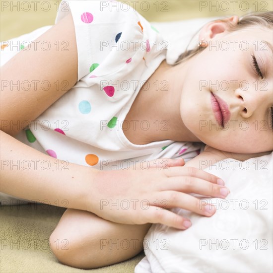 Close up cute little girl sleeping bed