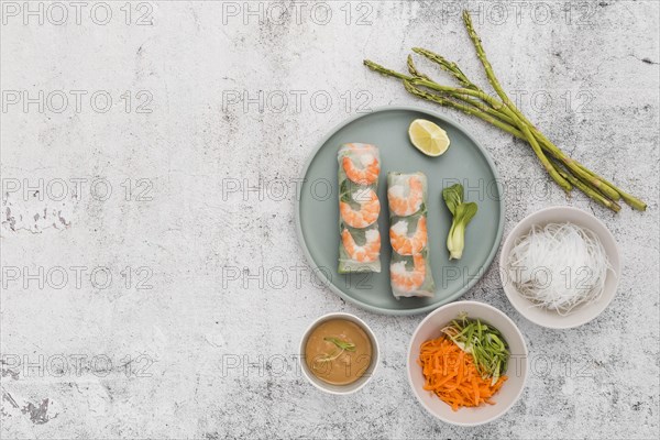Plate shrimp rolls with asparagus