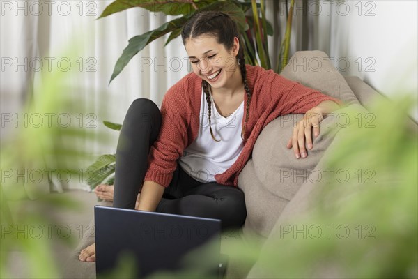 Woman with laptop home