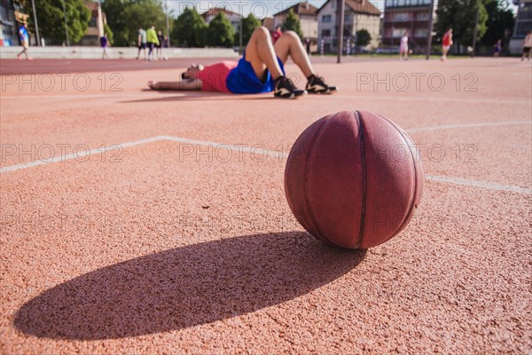 Basketball player floor with ball foreground