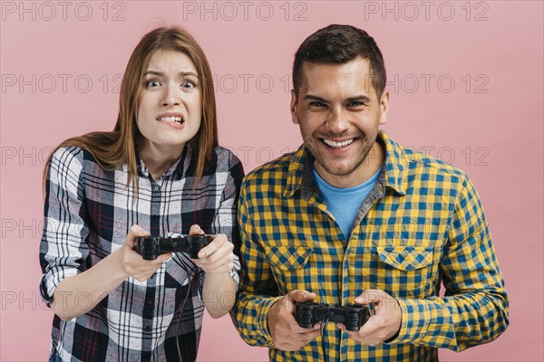 Front view best friends playing video games