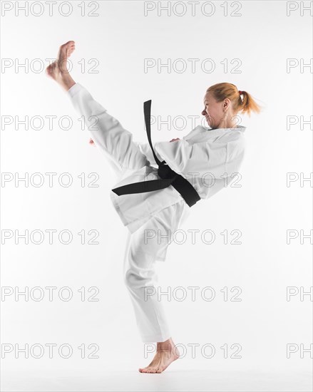 Caucasian karate fighter practicing