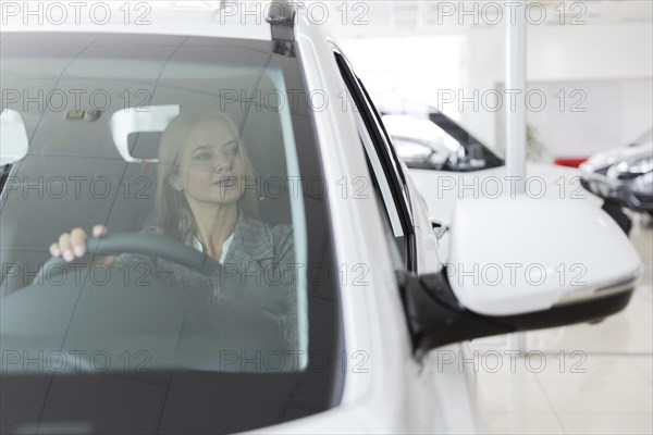 Blonde woman car